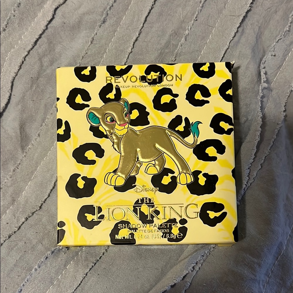 Makeup Revolution Lion King Eyeshadow Palette with Yellow and Black Design